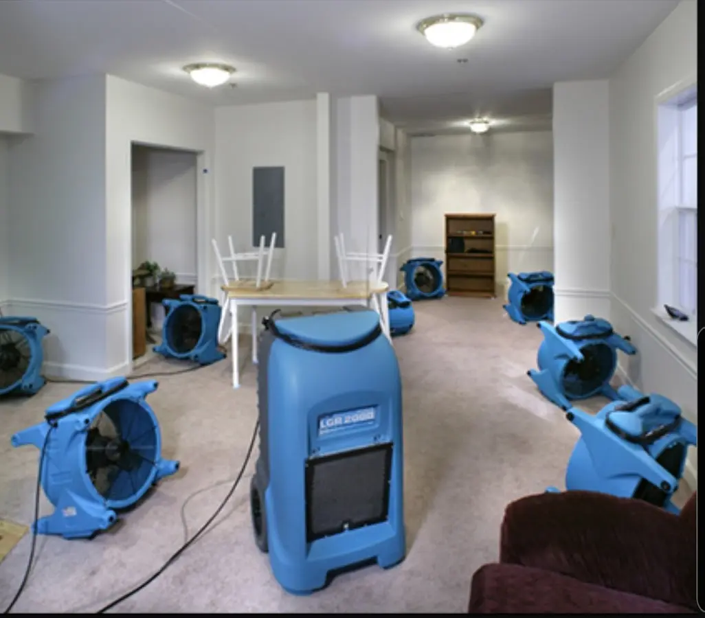 Air movers and dehumidifier setup for Water Damage Restoration in Creswell